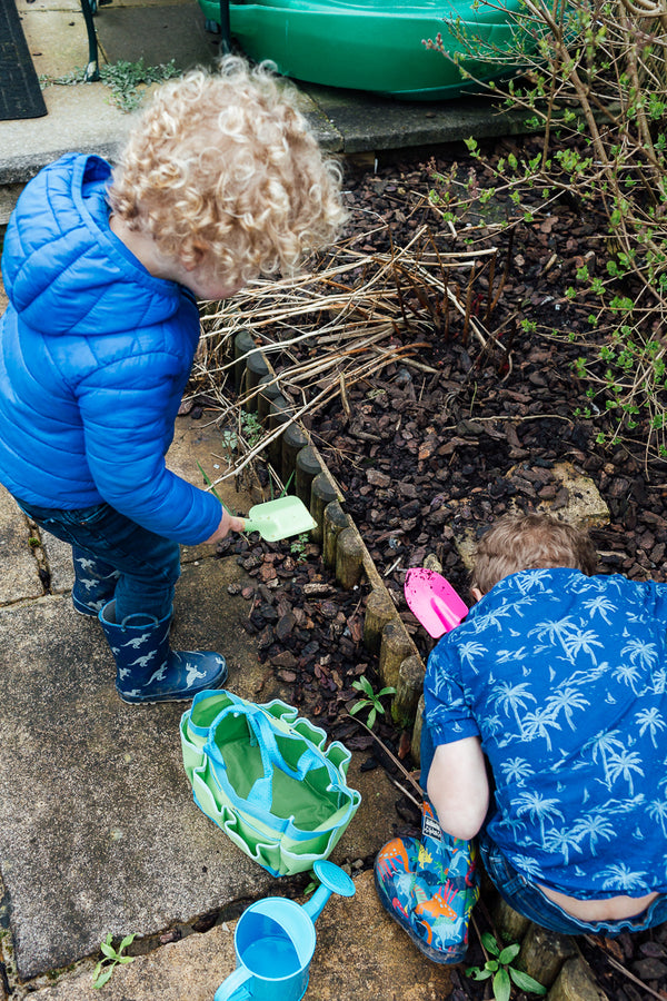 Children digging with Goki gardening set
